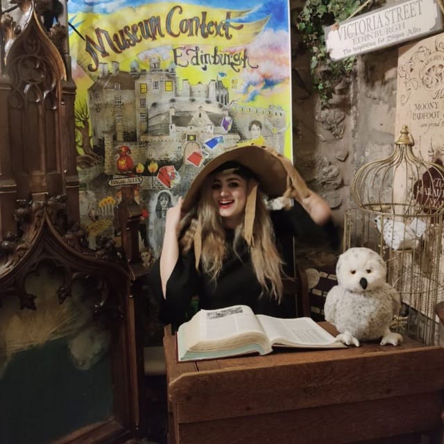 Dr. Homa Molavi enjoying a whimsical, bookish moment in Edinburgh
