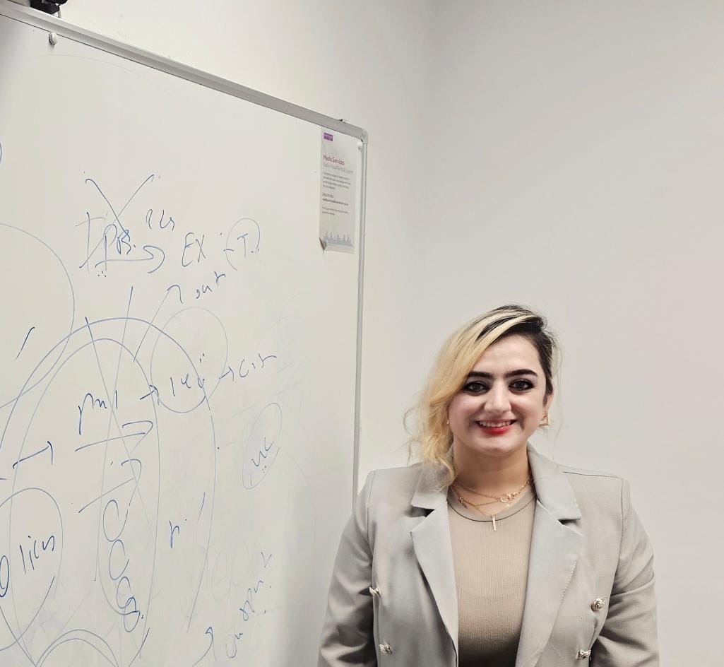 Dr. Homa Molavi in discussion